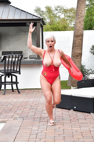 Tattooed blonde lifeguard strips and rides dick poolside