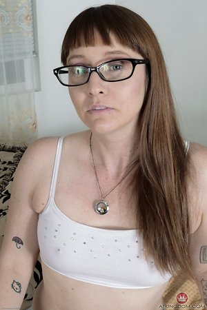 Small-tittied MILF with glasses strips in hairy moms pics